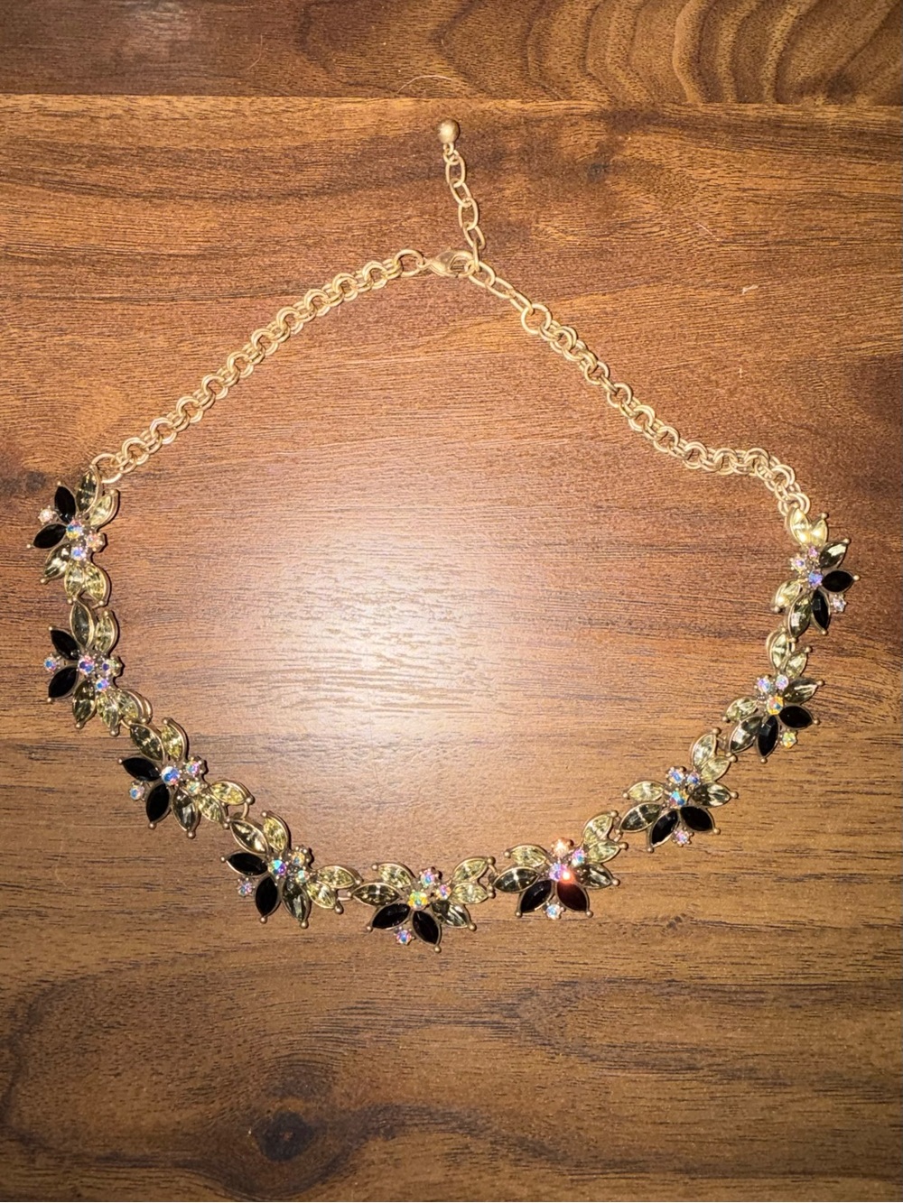 Gold Floral Crystal Necklace with Black Petal Accent